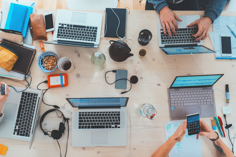 Team working together on laptops in an office